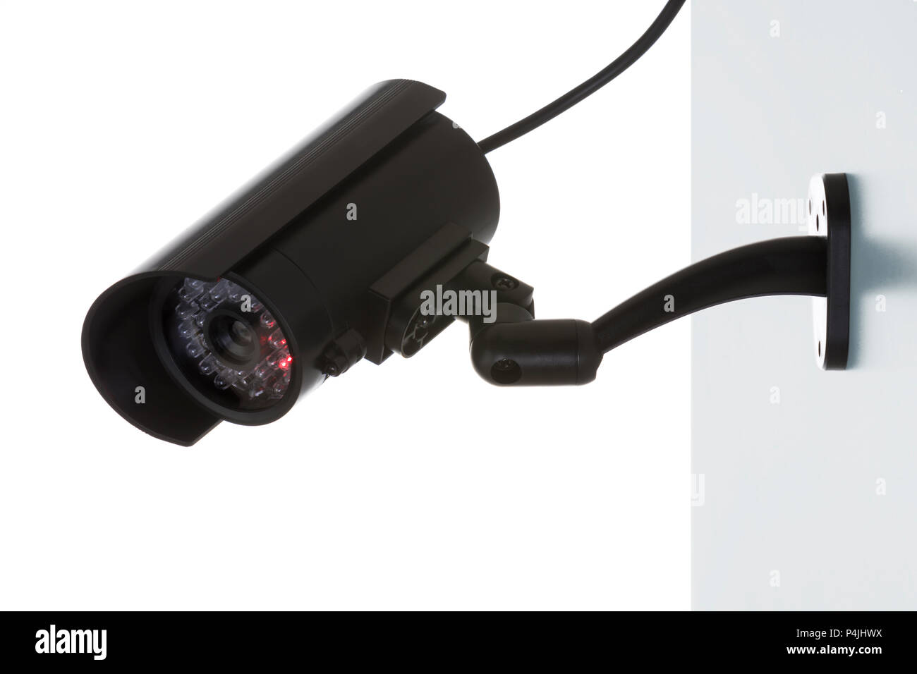 Wall-mounted surveillance camera isolated on white background Stock Photo