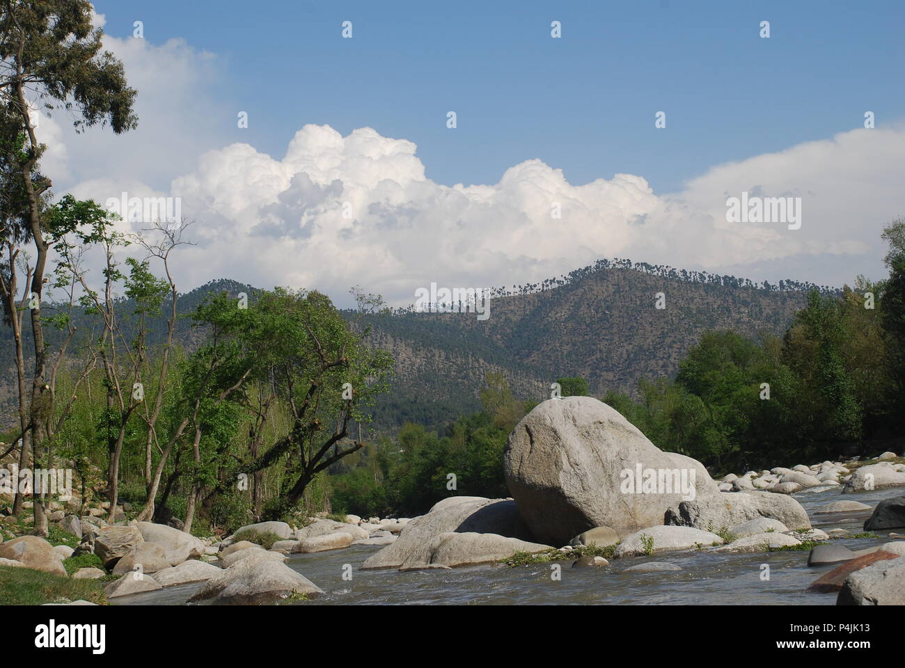 Scenic view by the river in Pakistan Stock Photo