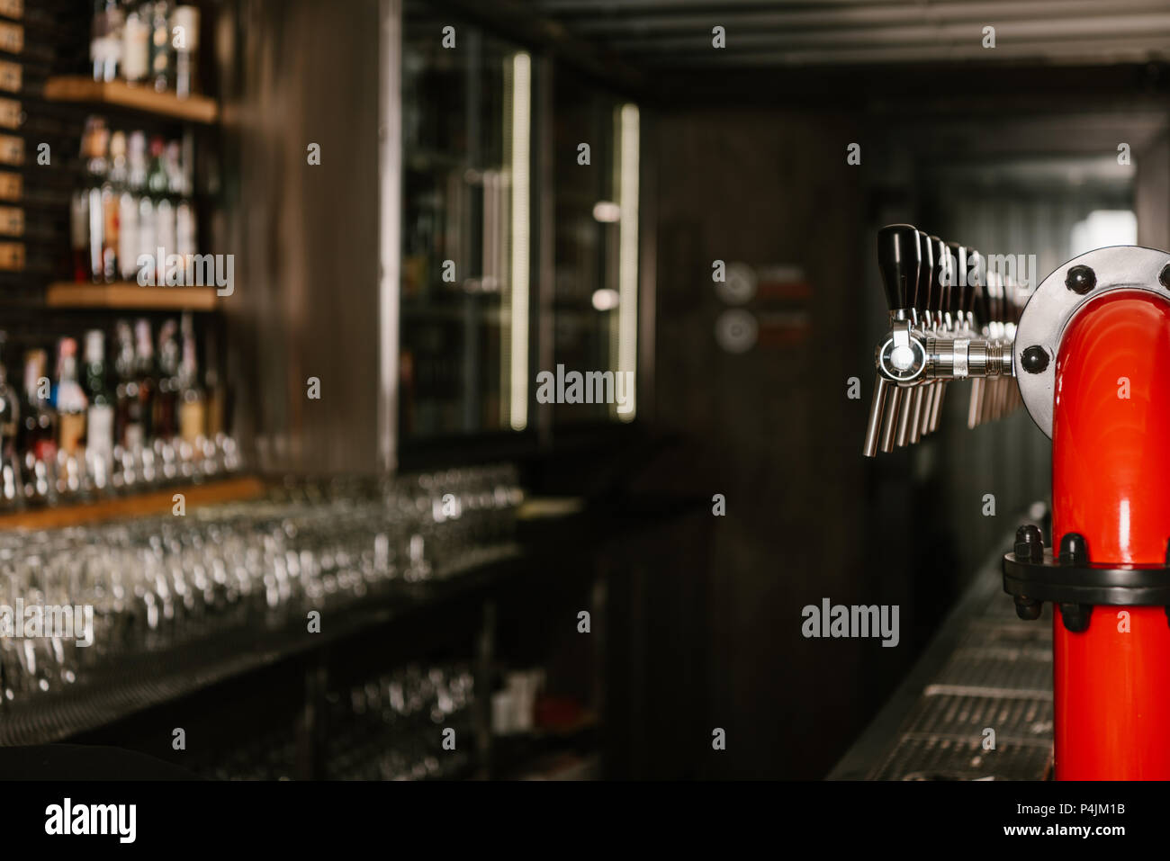 beer pipe taps in modern pub Stock Photo Alamy