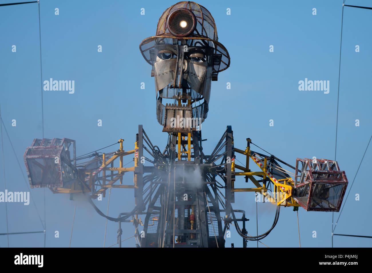 The Man Engine seen during the Volvo Ocean Race 2018 in Cardiff, Wales, UK. Man Engine, which resembles a giant miner, was launched in 2016 to celebra Stock Photo