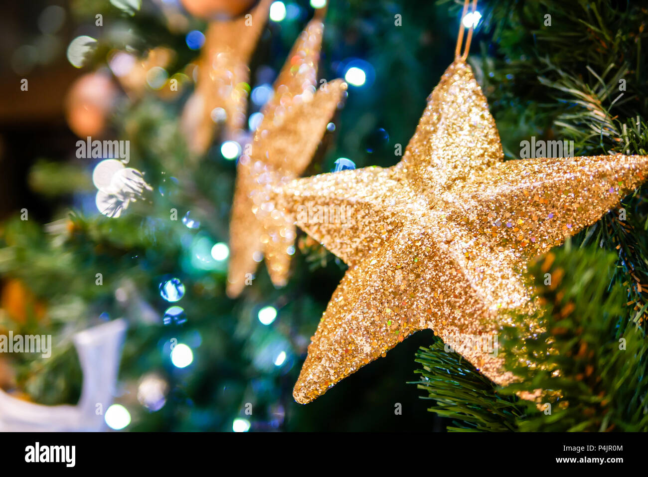christmas tree with gold star glitter Stock Photo - Alamy