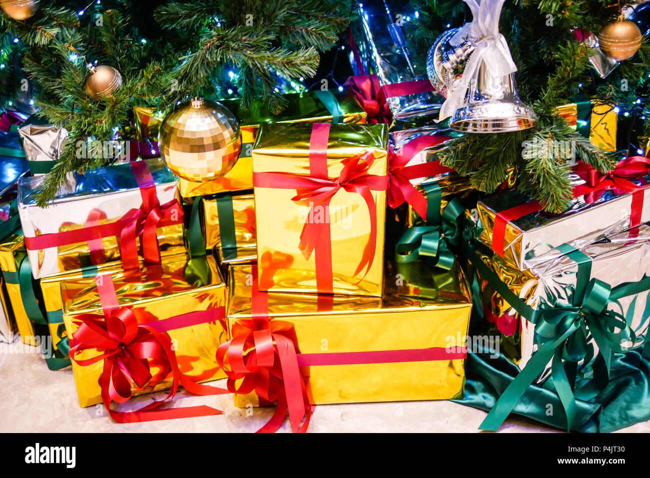 christmas tree with gold gift box Stock Photo - Alamy
