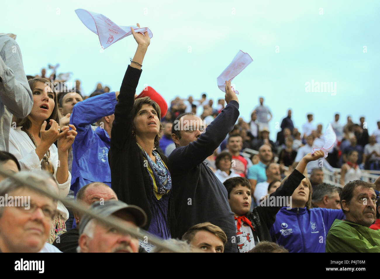 August 13, 2015 - Beziers, France: Members of the audience wave a white  handkerchief to express their satisfaction after a round of bullfighting in  the southern French town of Beziers. Despite growing