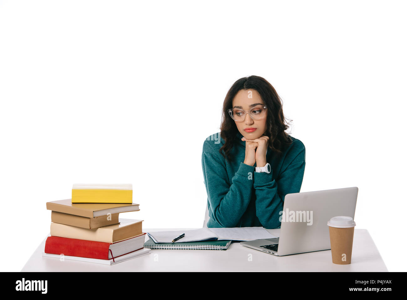sad african american teen student looking at stack of books isolated on ...