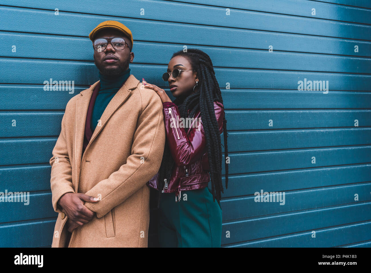 beautiful african american couple in fashionable outfit posing together ...