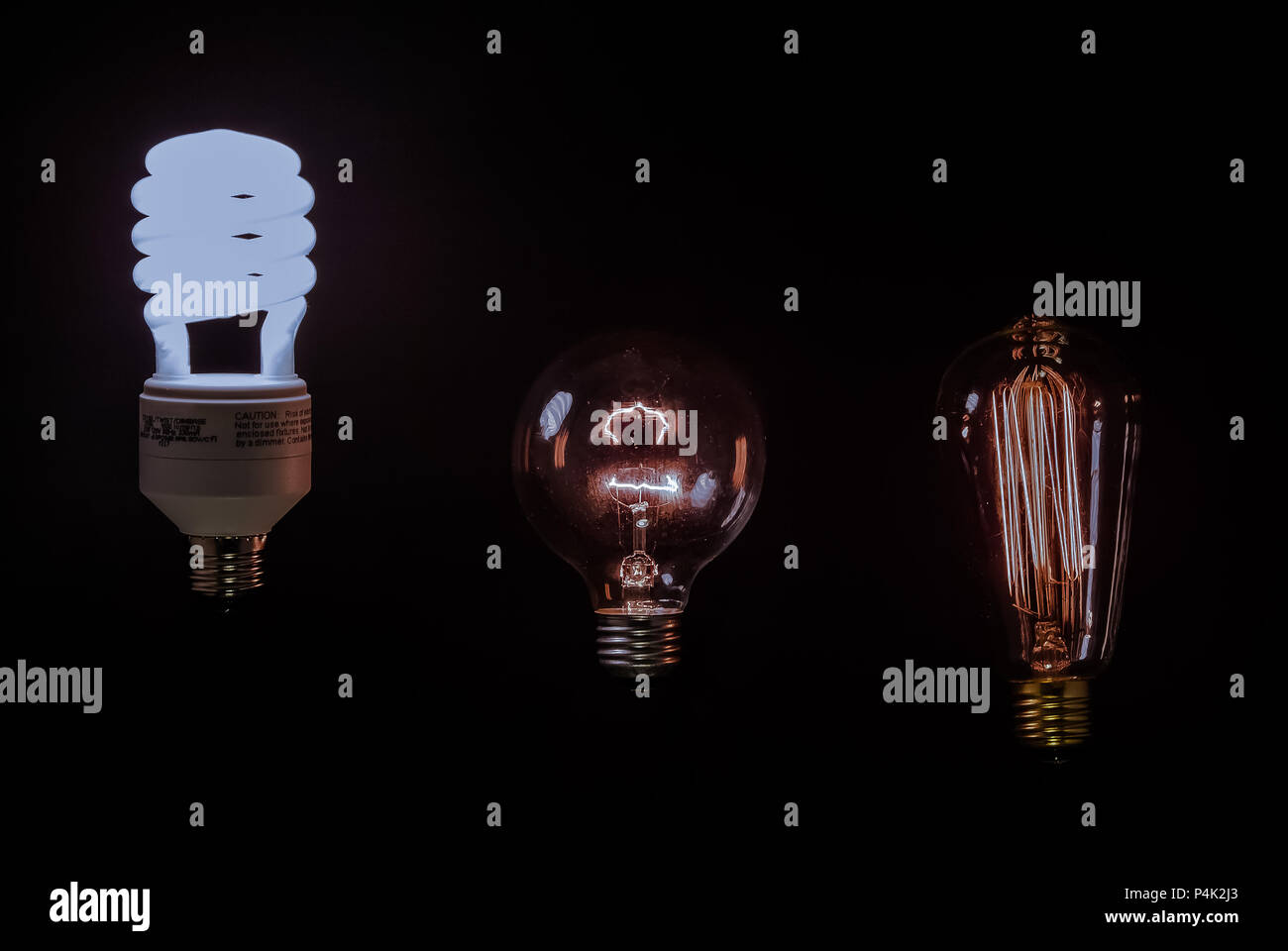 Still Life of Powered up Floating Illuminated Light Bulbs Stock Photo