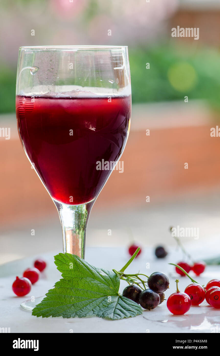 Creme De Cassis Black Currant And Red Currant Homemade Liqueur On The Bright Background Stock Photo Alamy