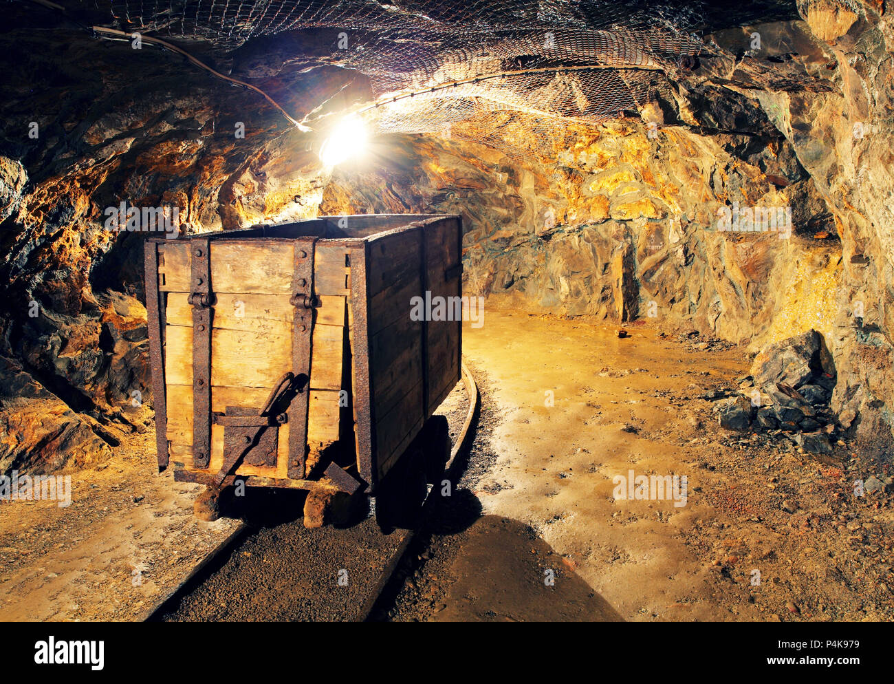 Mining cart in silver, gold, copper mine Stock Photo