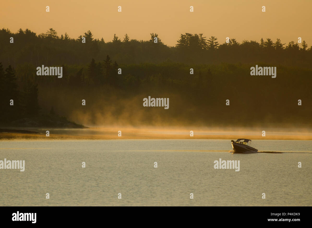 early morning fishers on lake of the woods Stock Photo