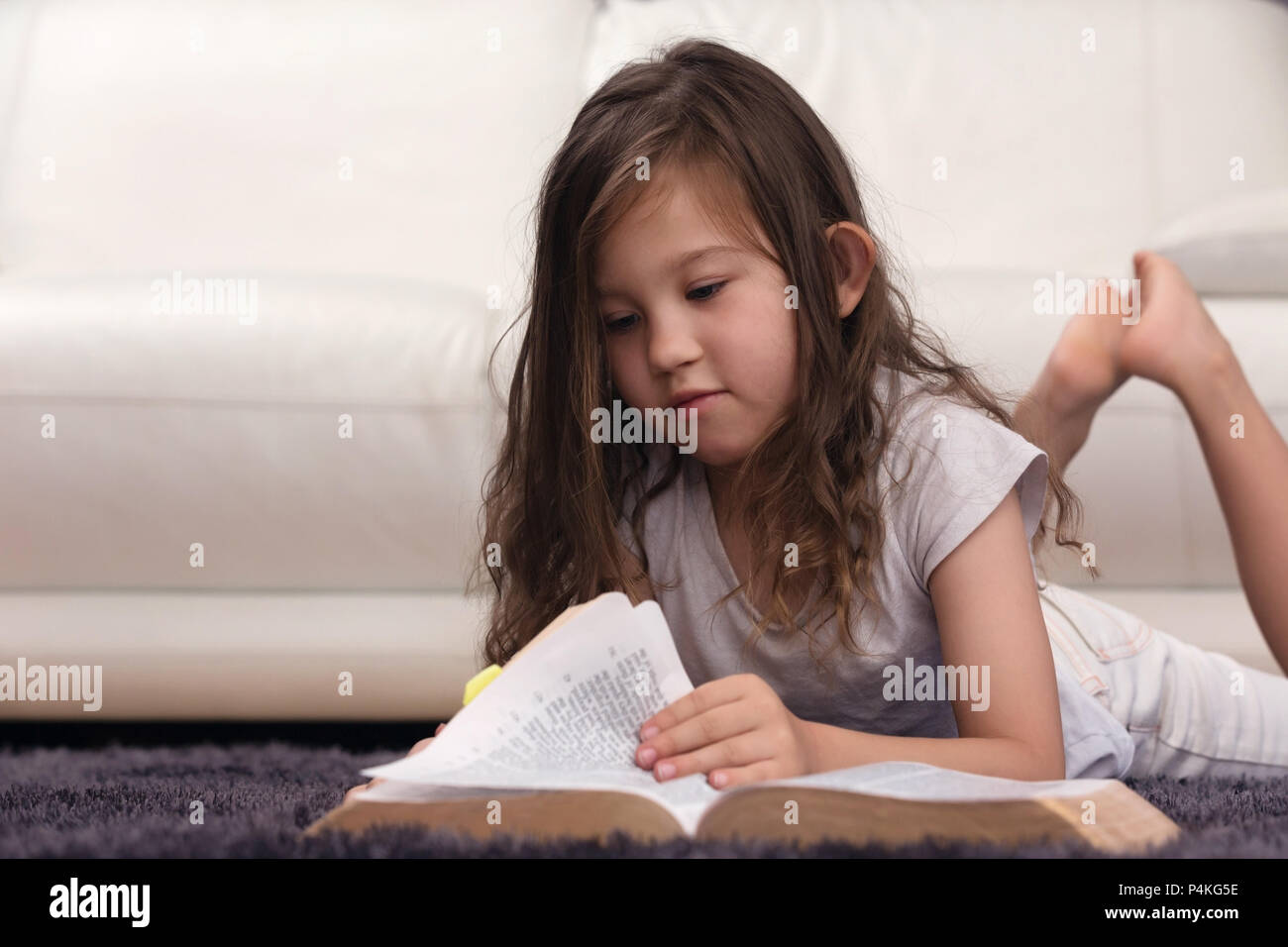 Young Child Learning the Word of God Stock Photo