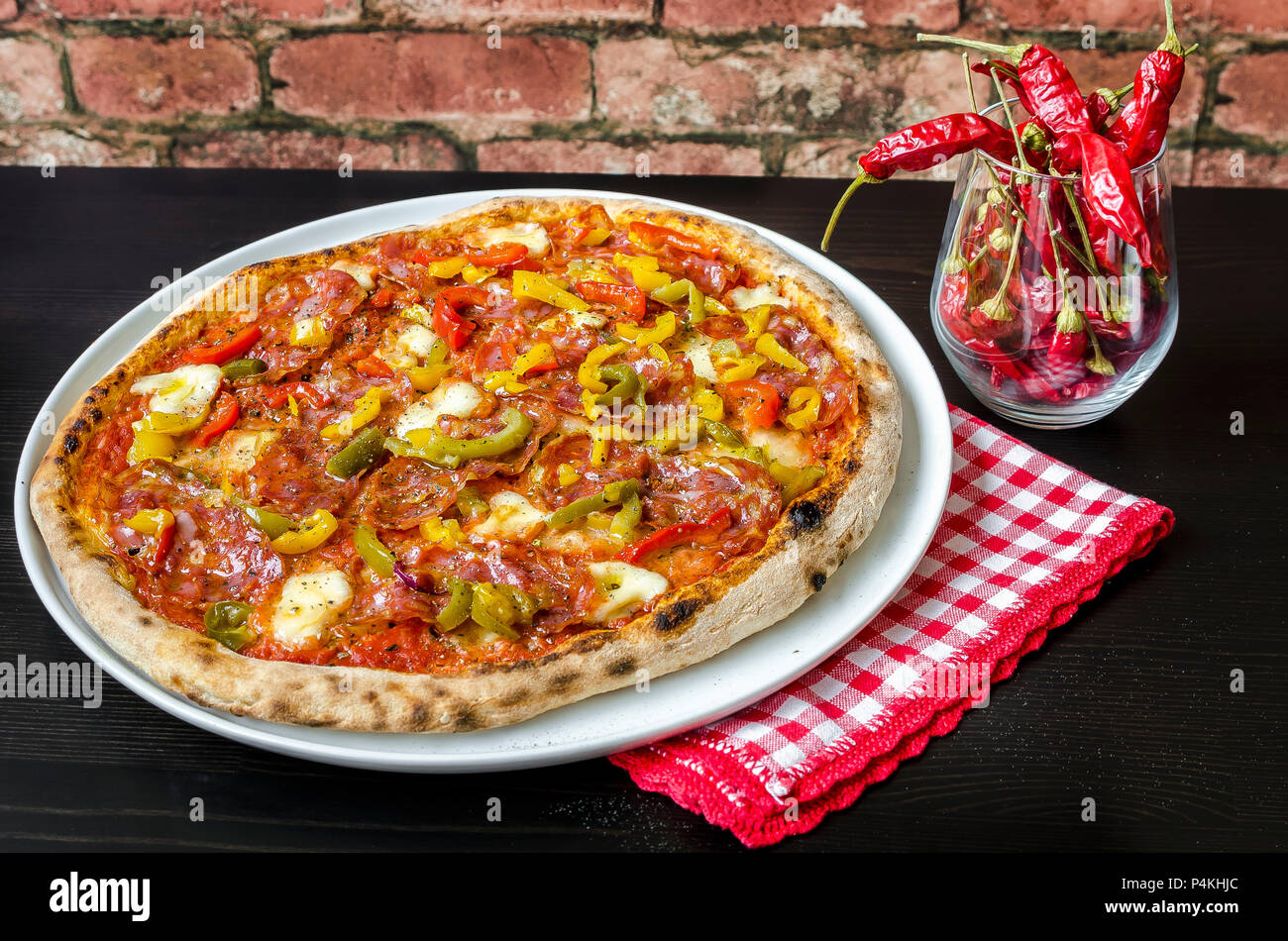 Pizza made with a sourdough base, tomato sauce with oregano and olive