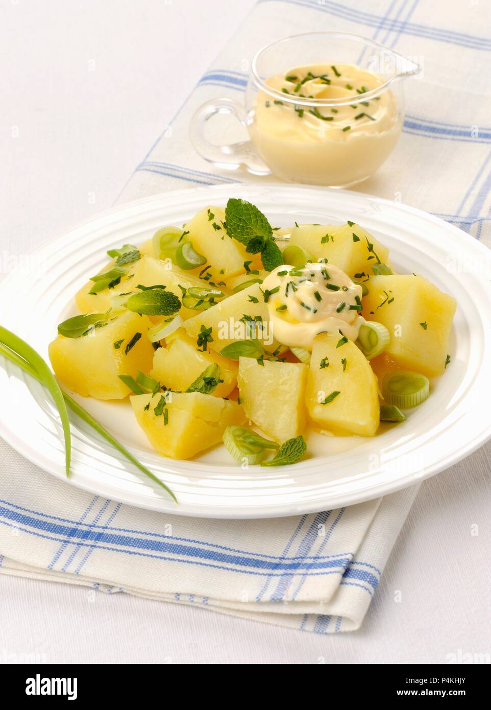Potato salad with fresh herbs and homemade mayonnaise Stock Photo