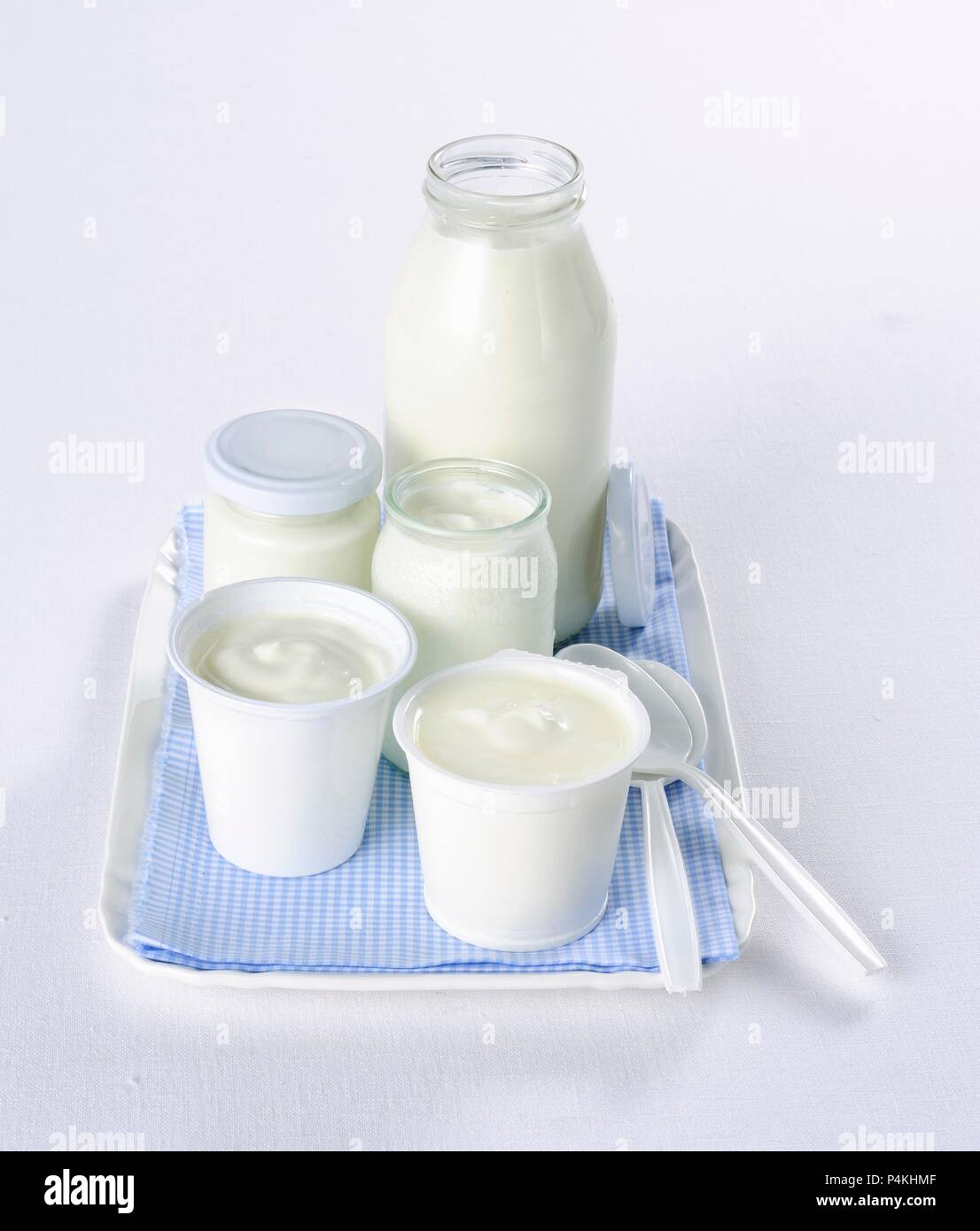 Yoghurt in assorted glasses and cups Stock Photo Alamy