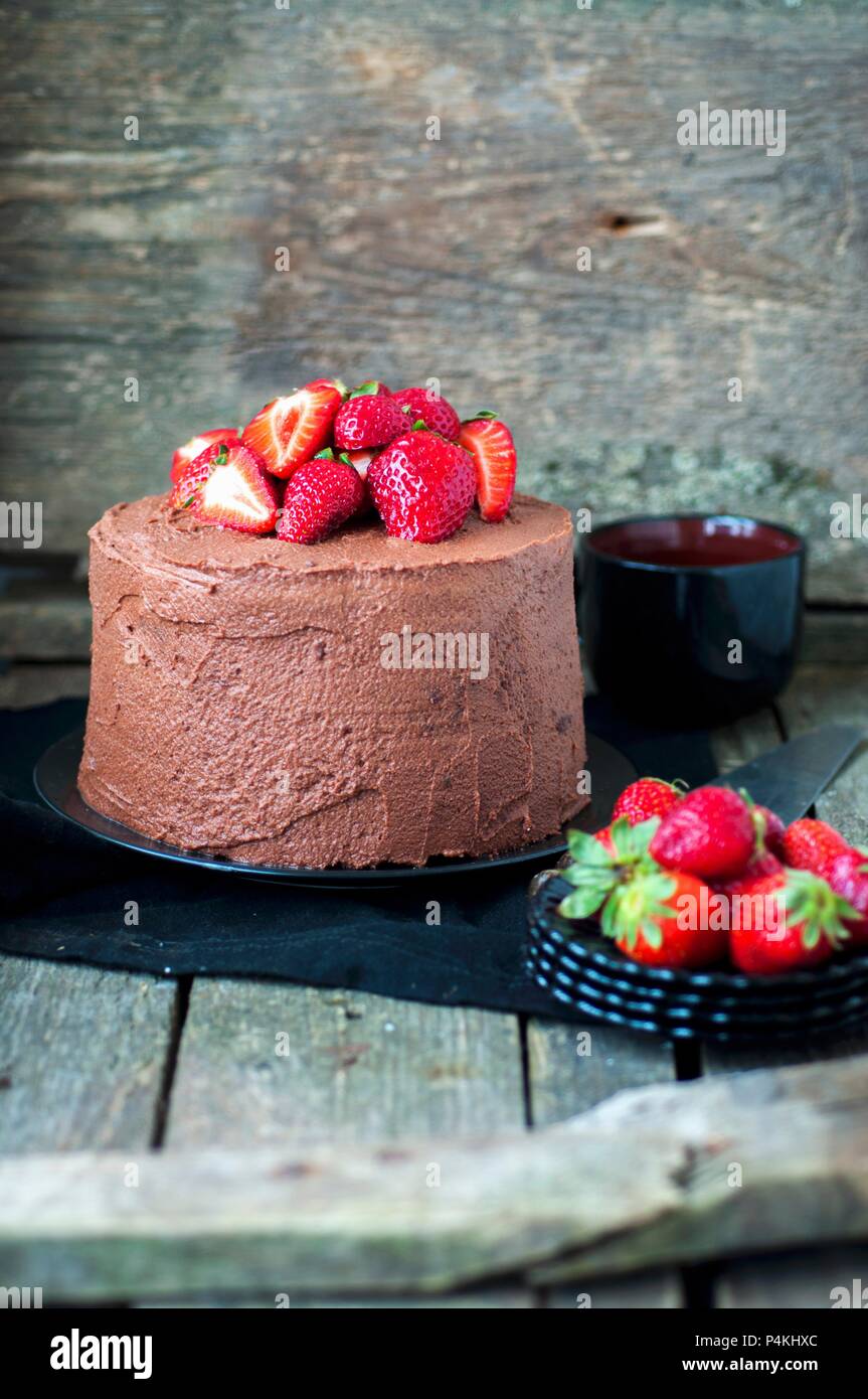 A chocolate cake with strawberries Stock Photo - Alamy