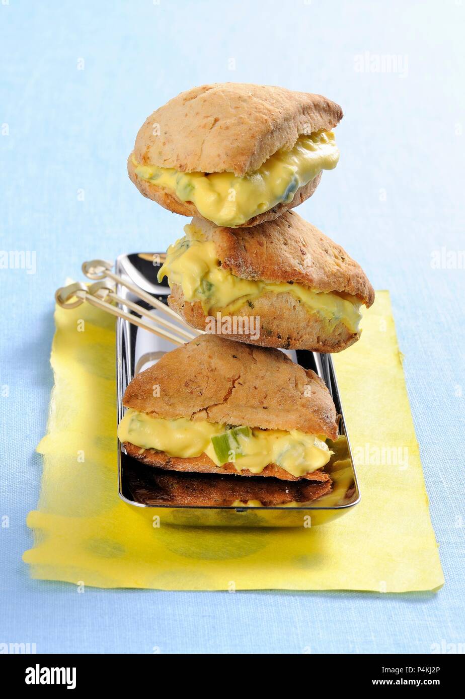Herb scones with cheese and vegetable cream Stock Photo