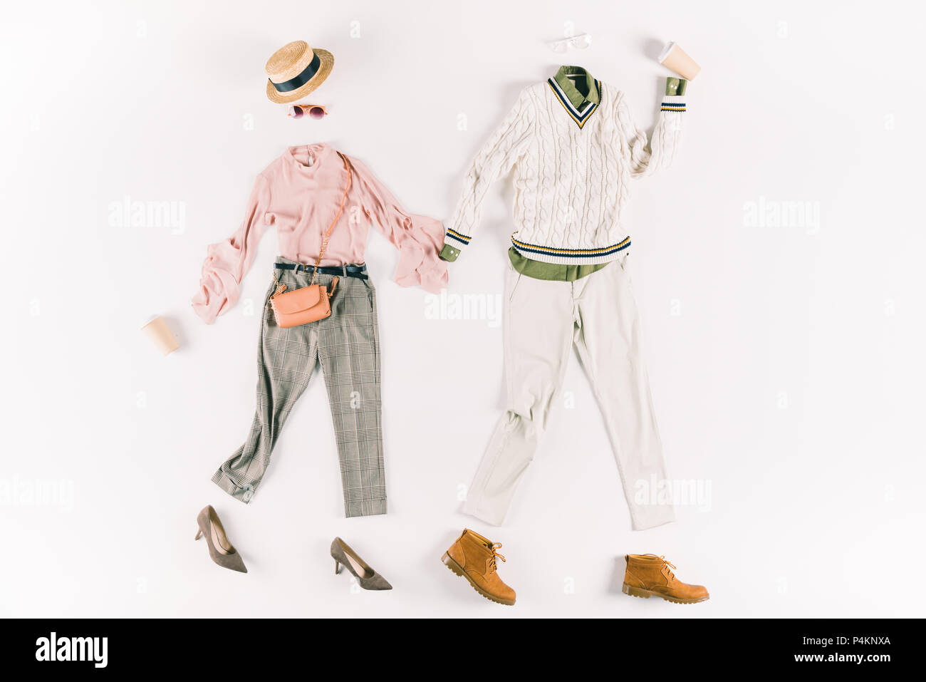 stylish male and female clothes with paper cups isolated on white Stock ...