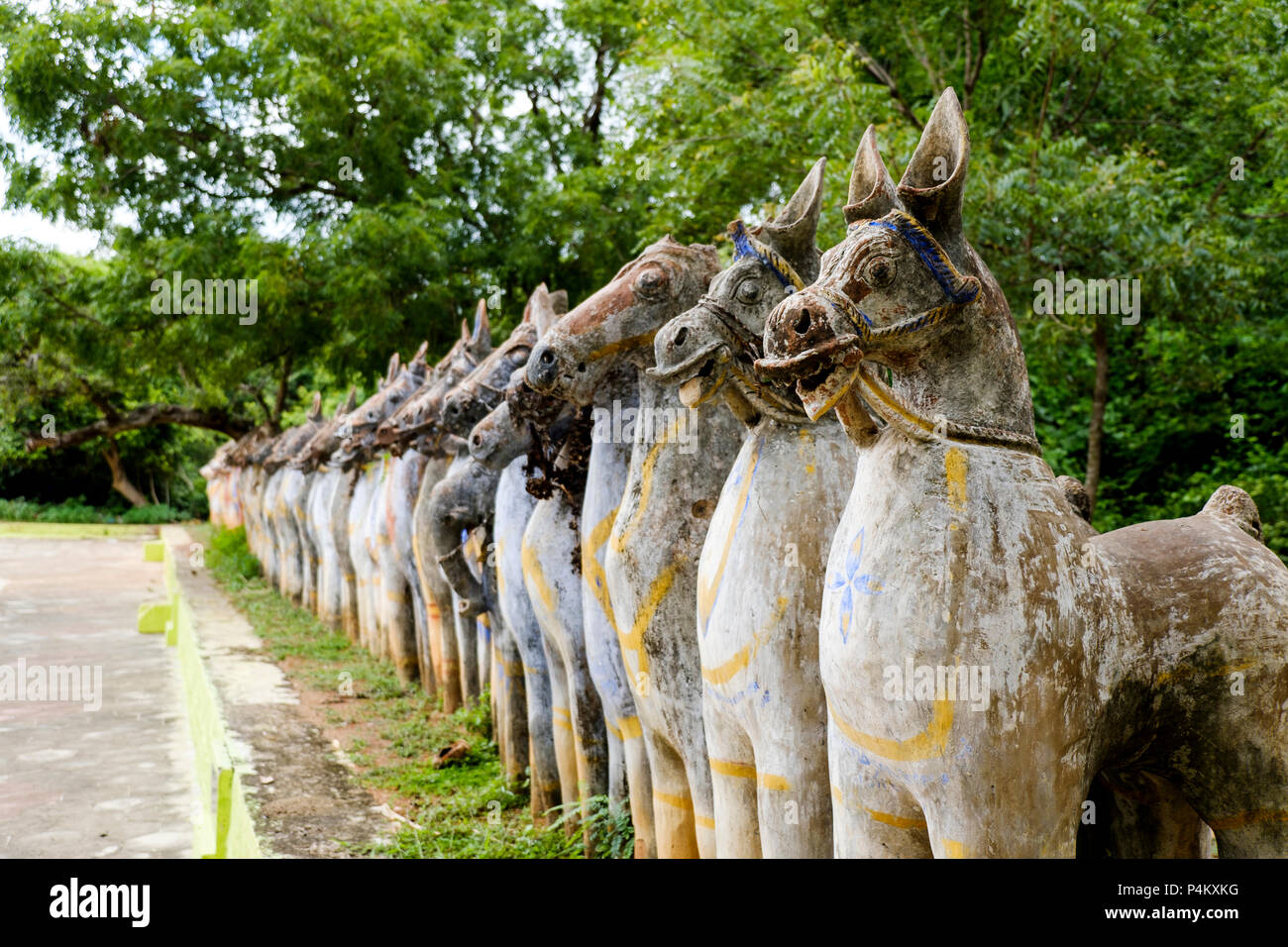 Painted terracotta horse statues at a village temple dedicated to Ayyanar god, Tamil Nadu, India. Stock Photo