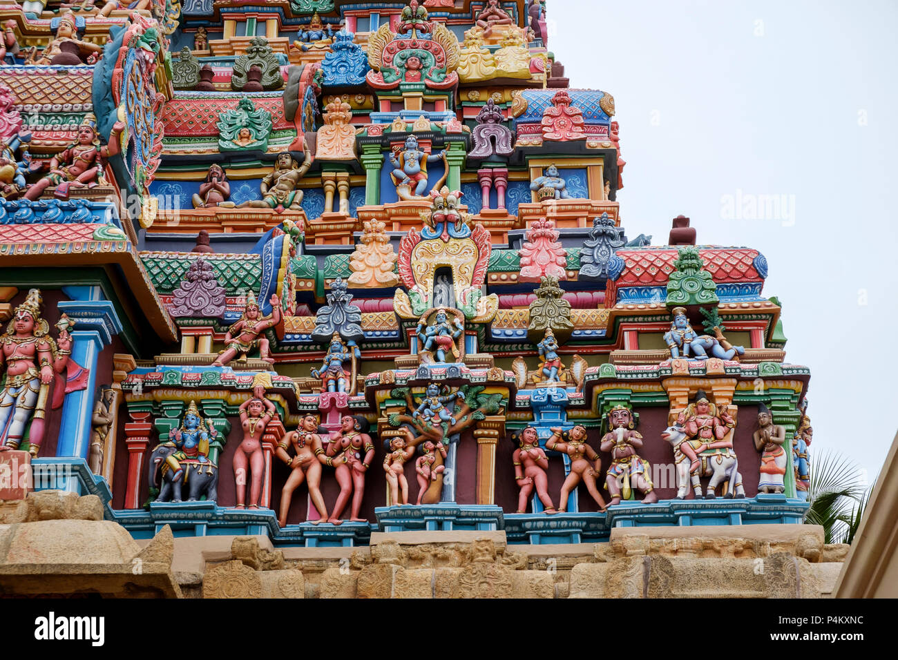 Lower level of gopura representing Hindu legend of bathing cowgirls &  Krishna. Sri Ranganathaswamy Temple, Tiruchirappali District, Tamil Nadu, India Stock Photo