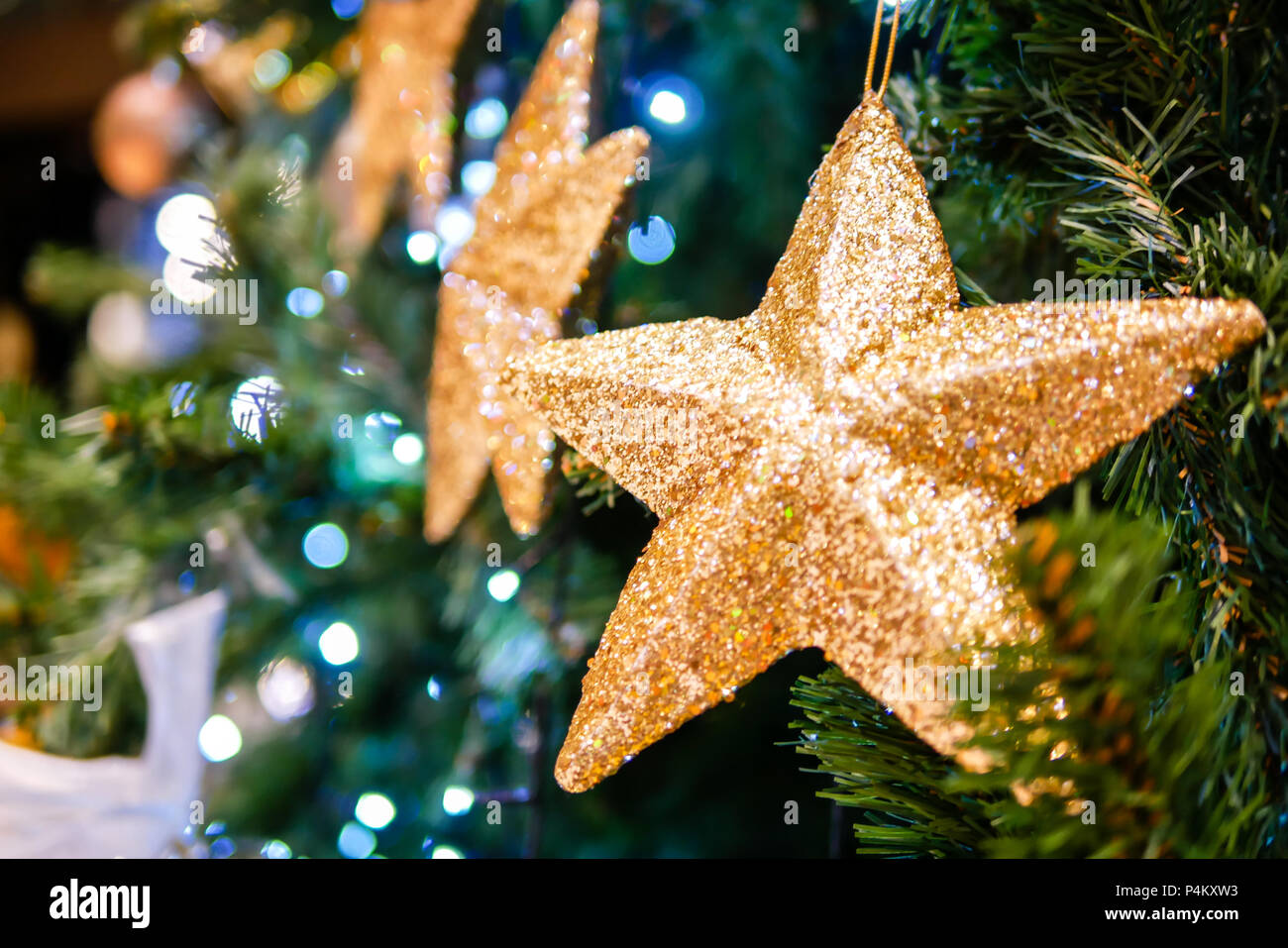 christmas tree with gold star glitter Stock Photo Alamy