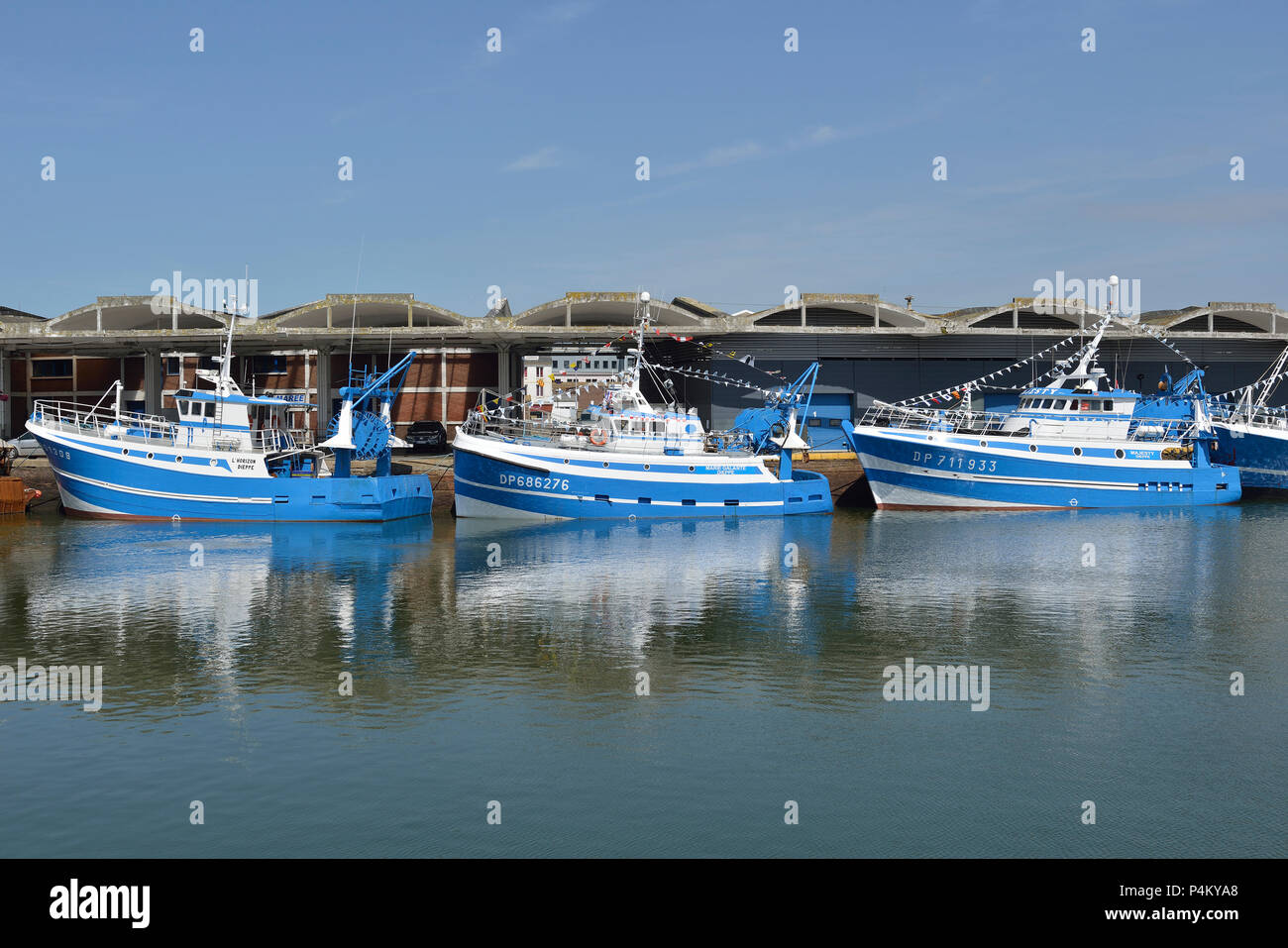 Fishing fleet  decked with bunting for the Festival of the Sea, Dieppe, Normandy, France Stock Photo