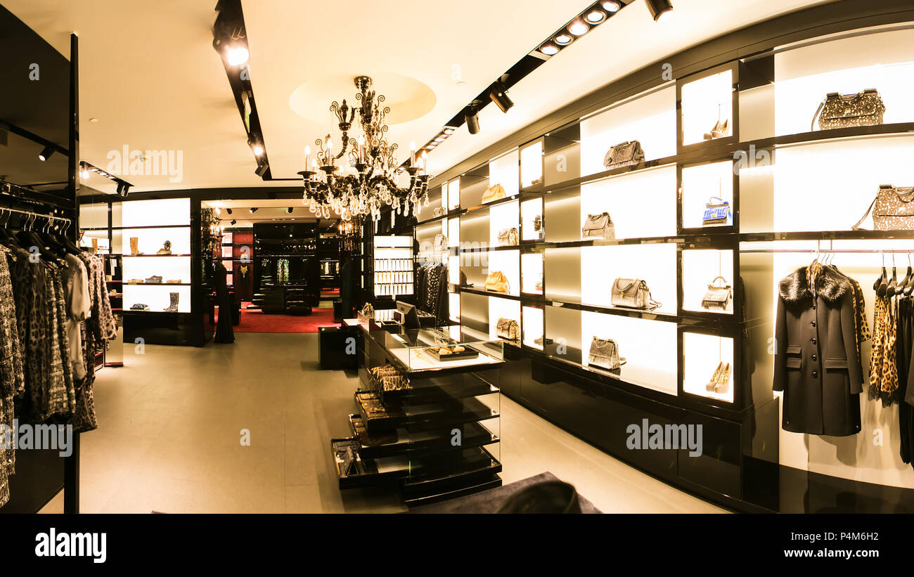 bright and fashionable interior of shoe store in modern mall Stock ...