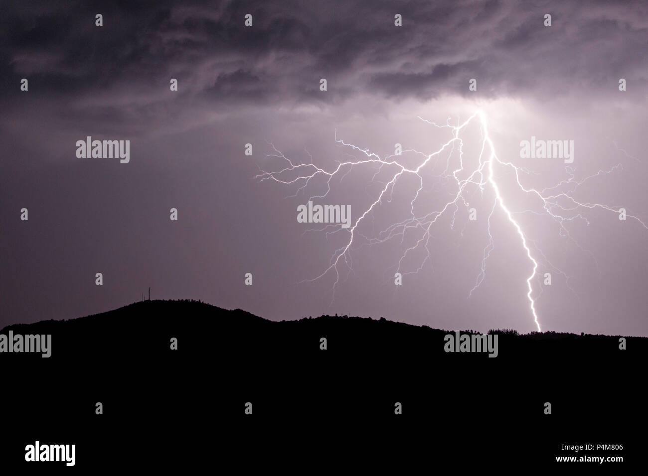 Allariz, Galicia / Spain - Jun 21 2018: lightning strike during a thunderstorm. Stock Photo