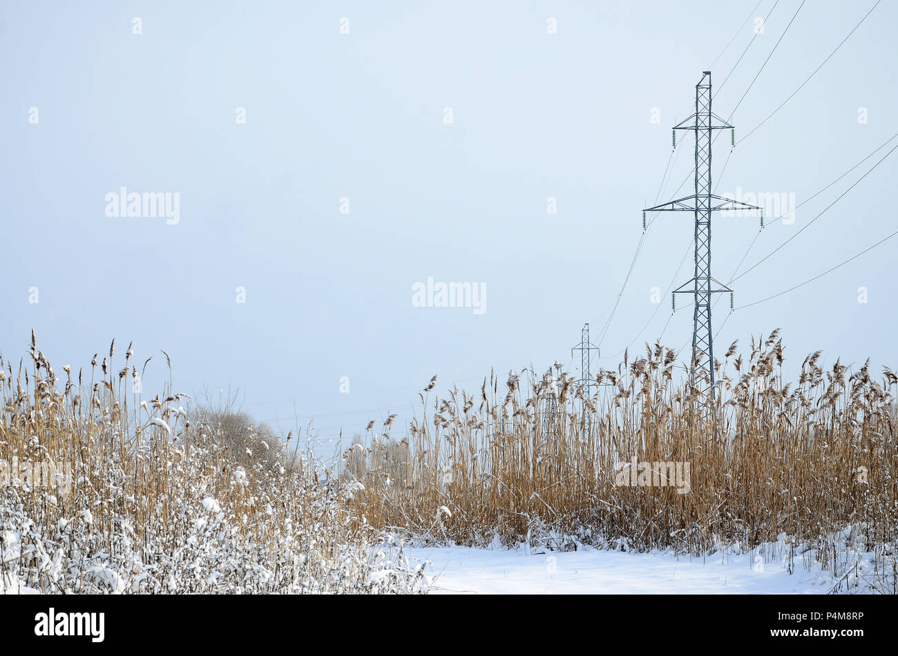 Electricity pylons covered in snow hi-res stock photography and images ...