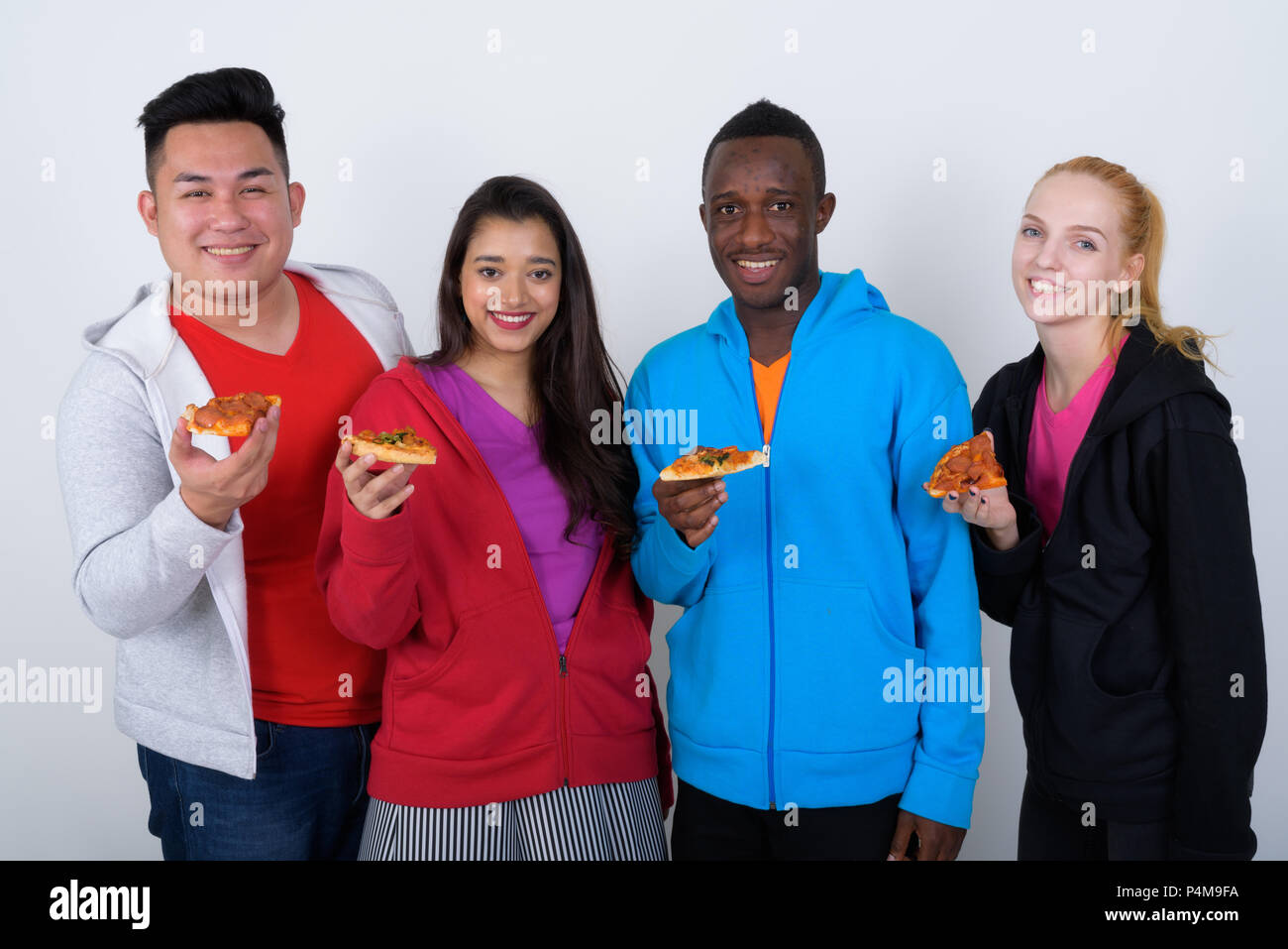 Group happy friends pizza hi-res stock photography and images - Alamy