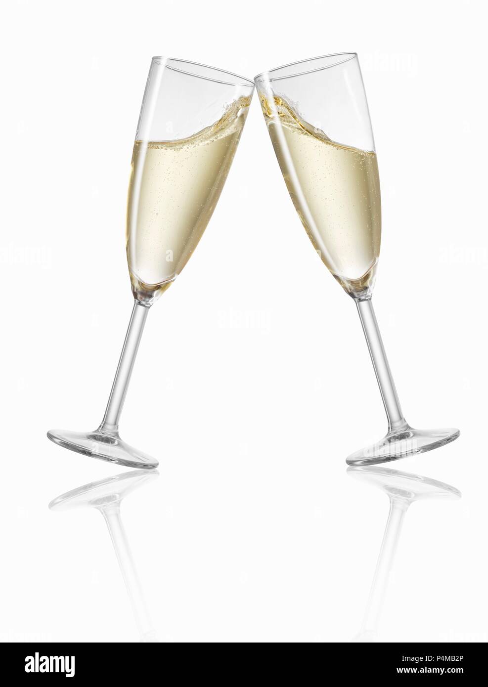 Clinking champagne glasses Stock Photo