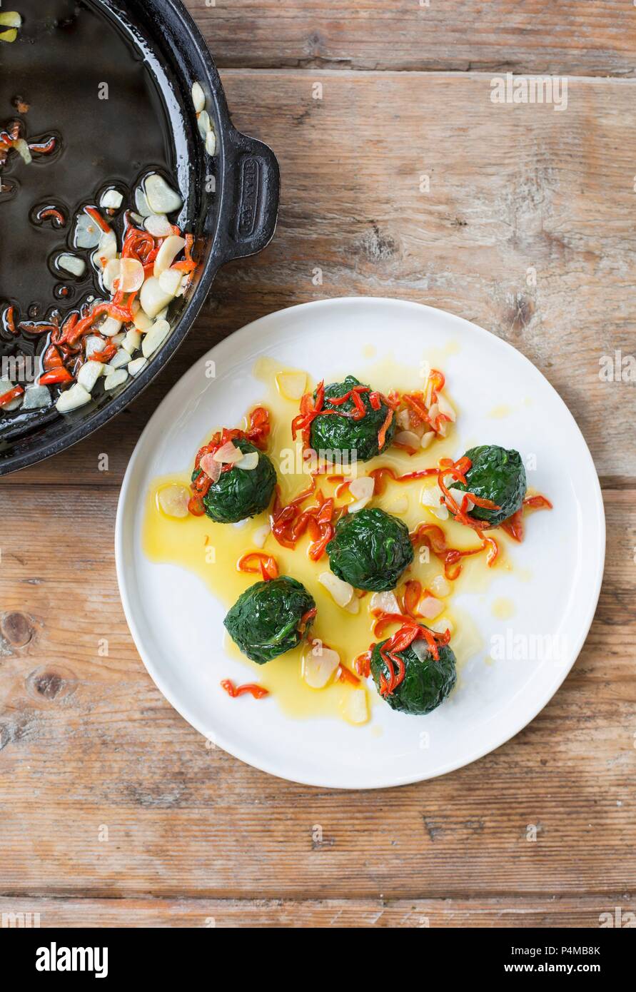 Spinach balls with chilli and garlic Stock Photo Alamy