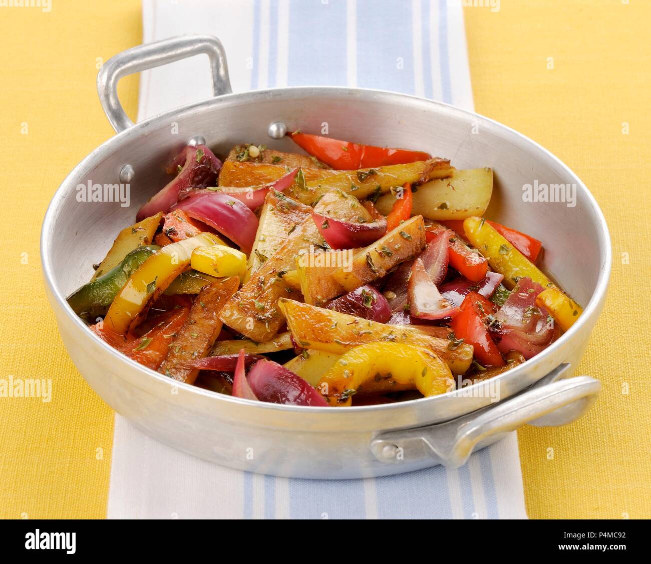 Colourful fried vegetables with oregano Stock Photo