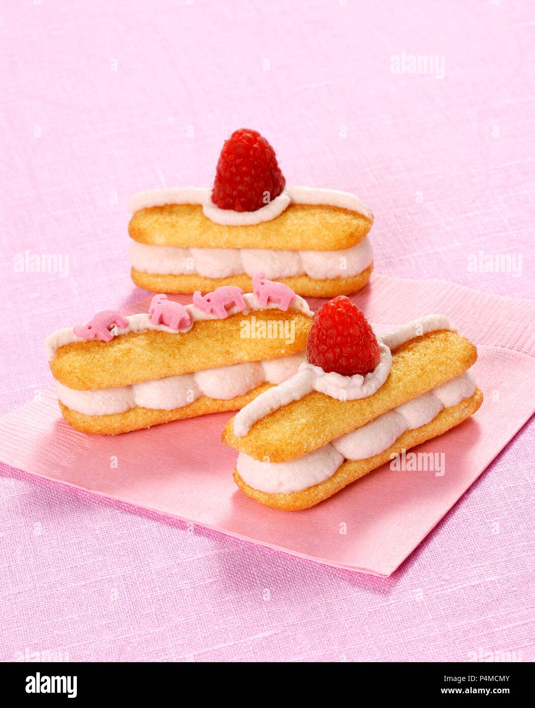 Sponge finger sandwiches with raspberry mousse Stock Photo