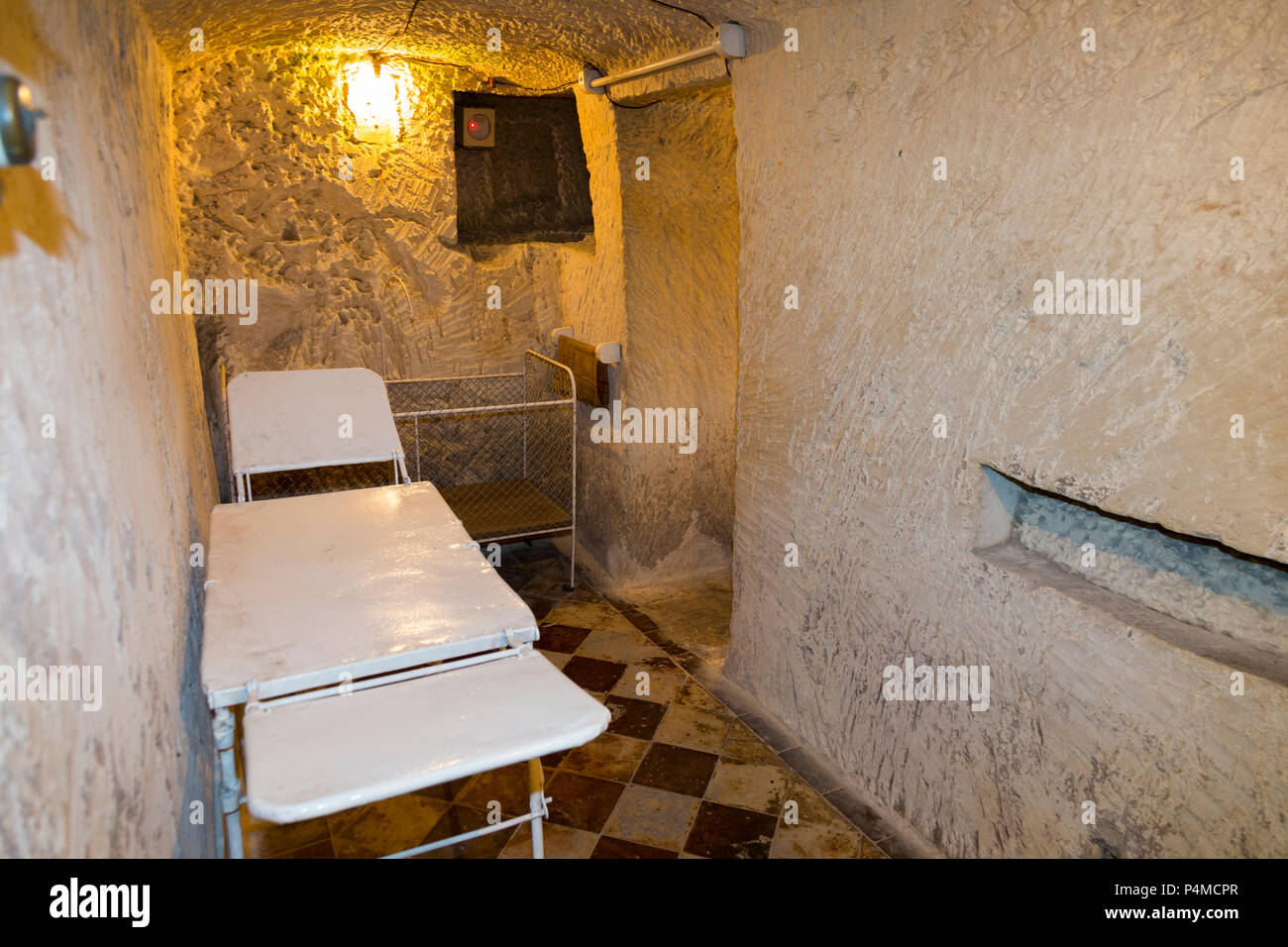 Medical room with baby / child / children cot within the air raid shelter tunnel / tunnels inside / underground at the Malta At War Museum, Malta (91 Stock Photo