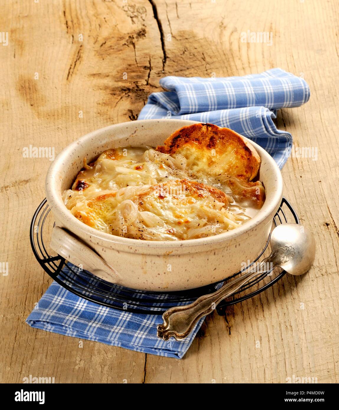 Onion soup with toasted cheese croute Stock Photo