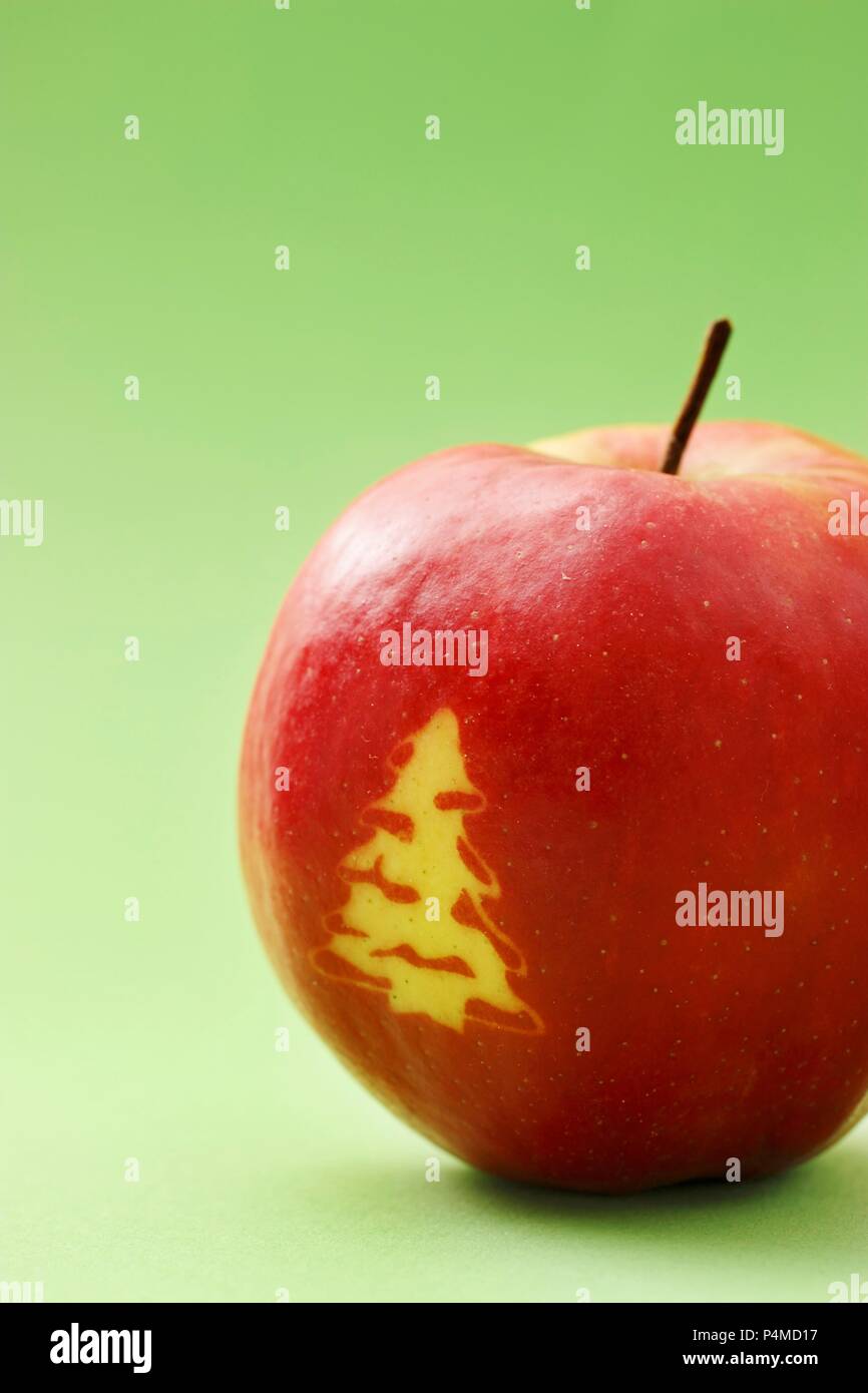 Red apple with a Christmas tree Stock Photo