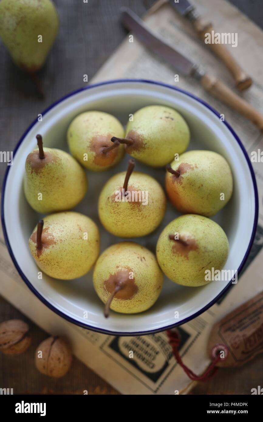 Pears in a metal bowl Stock Photo