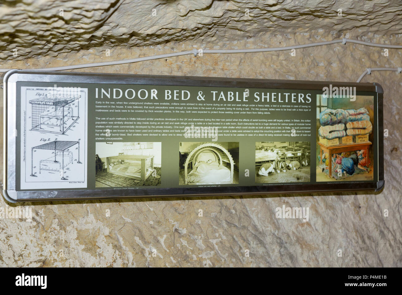 Instructions and demonstration tables: shelter protection from air raid / shelter tunnel / tunnels inside / underground at the Malta At War Museum, Malta. (91) Stock Photo