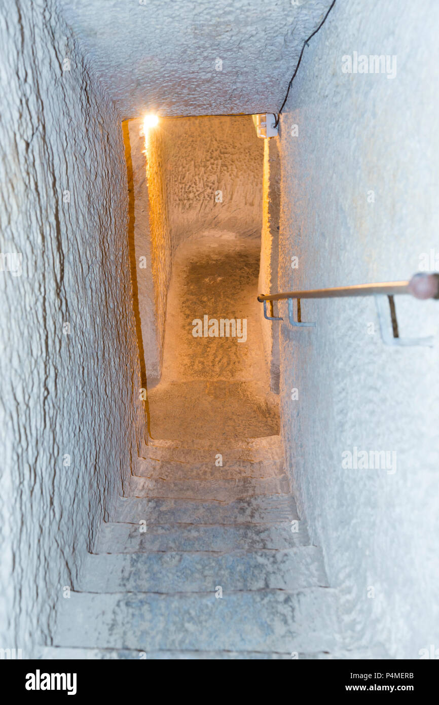 Staircase / step / steps leading down the air raid shelter tunnel / tunnels inside / underground at the  Malta At War Museum, Vittoriosa, Malta. Stock Photo