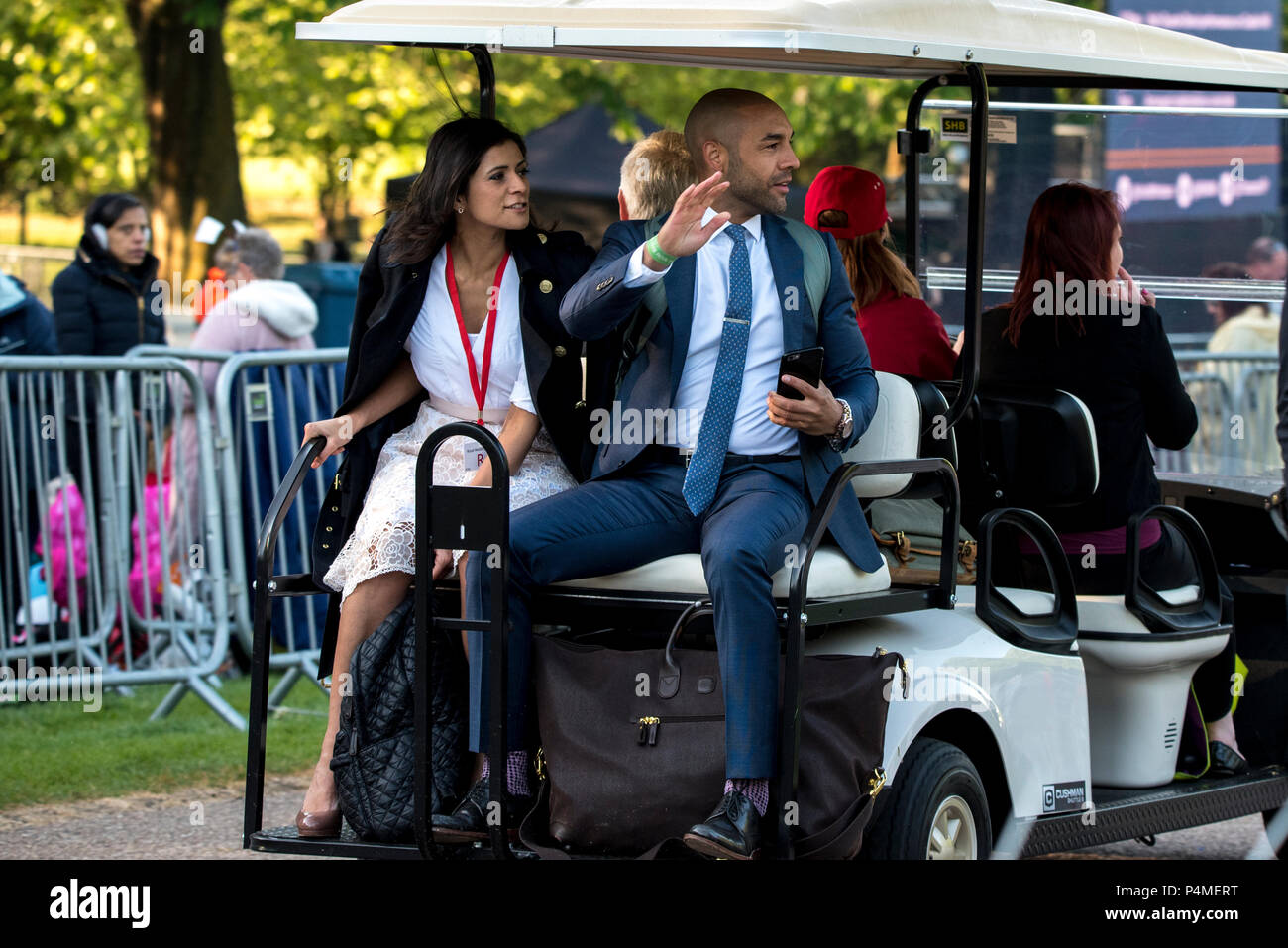 Celebrities, journalists, presenters and wedding guests arrived along the  Long Walk by golf cart. As the passed, the crowds waiting on the Long Walk  would cheer, as it was now hours away