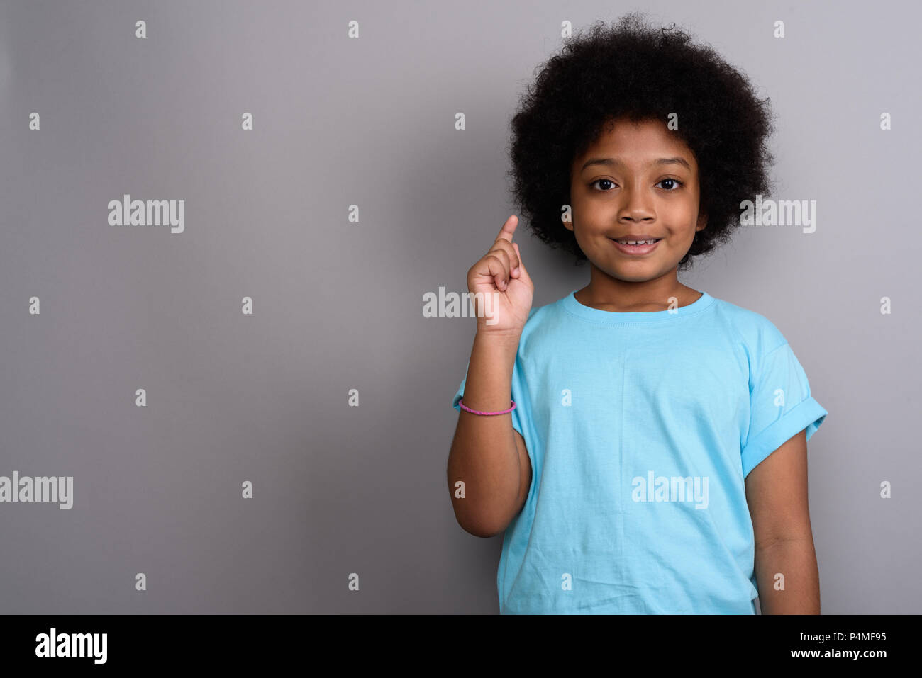 African girl pointing hi-res stock photography and images - Alamy