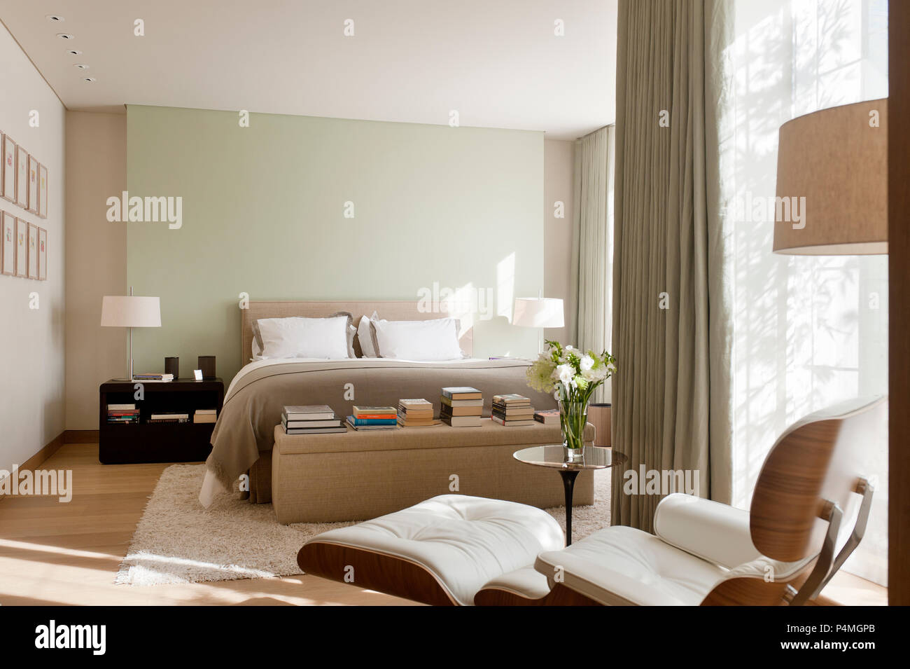 Armchair in bedroom Stock Photo Alamy