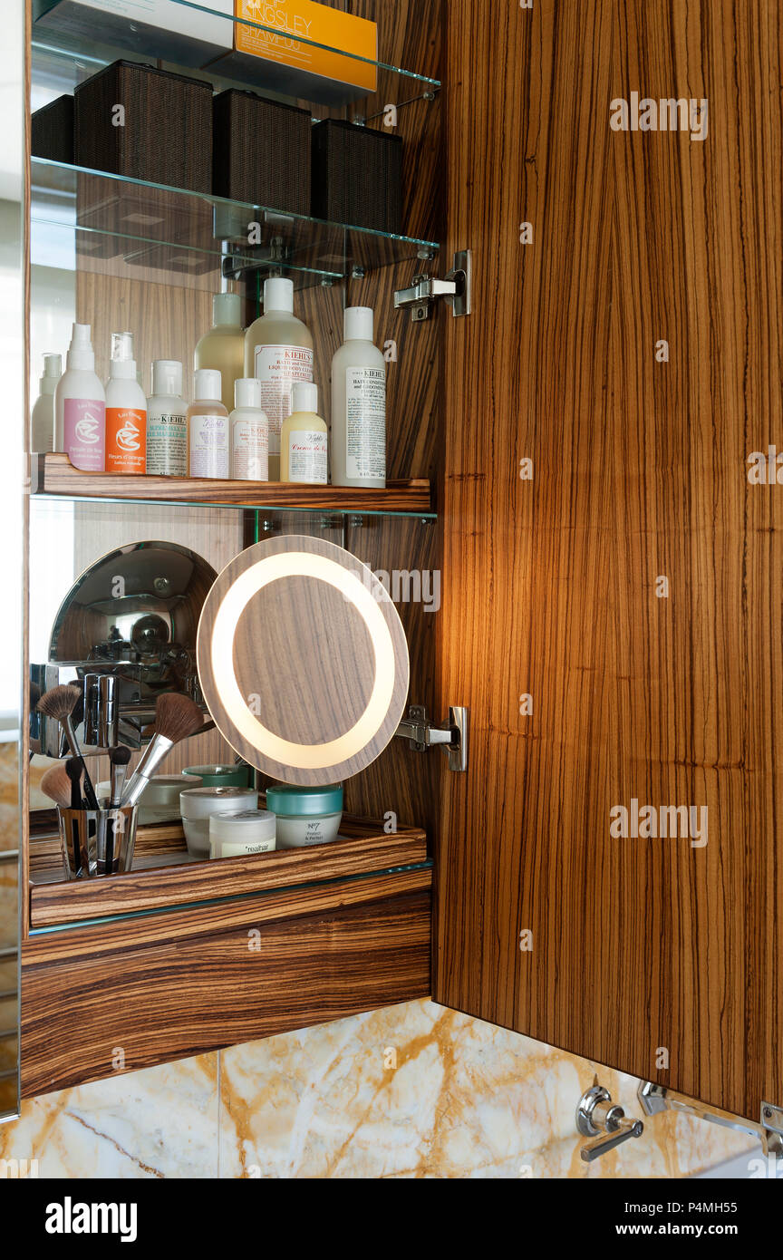 Shaving mirror in bathroom cupboard Stock Photo Alamy