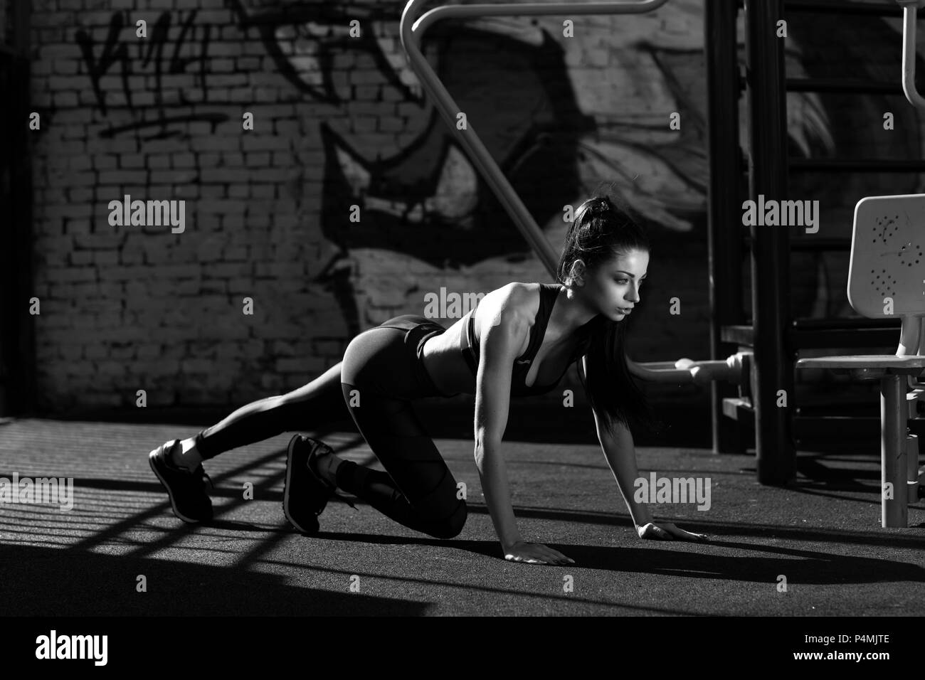 Fitness female model exercising Stock Photo - Alamy