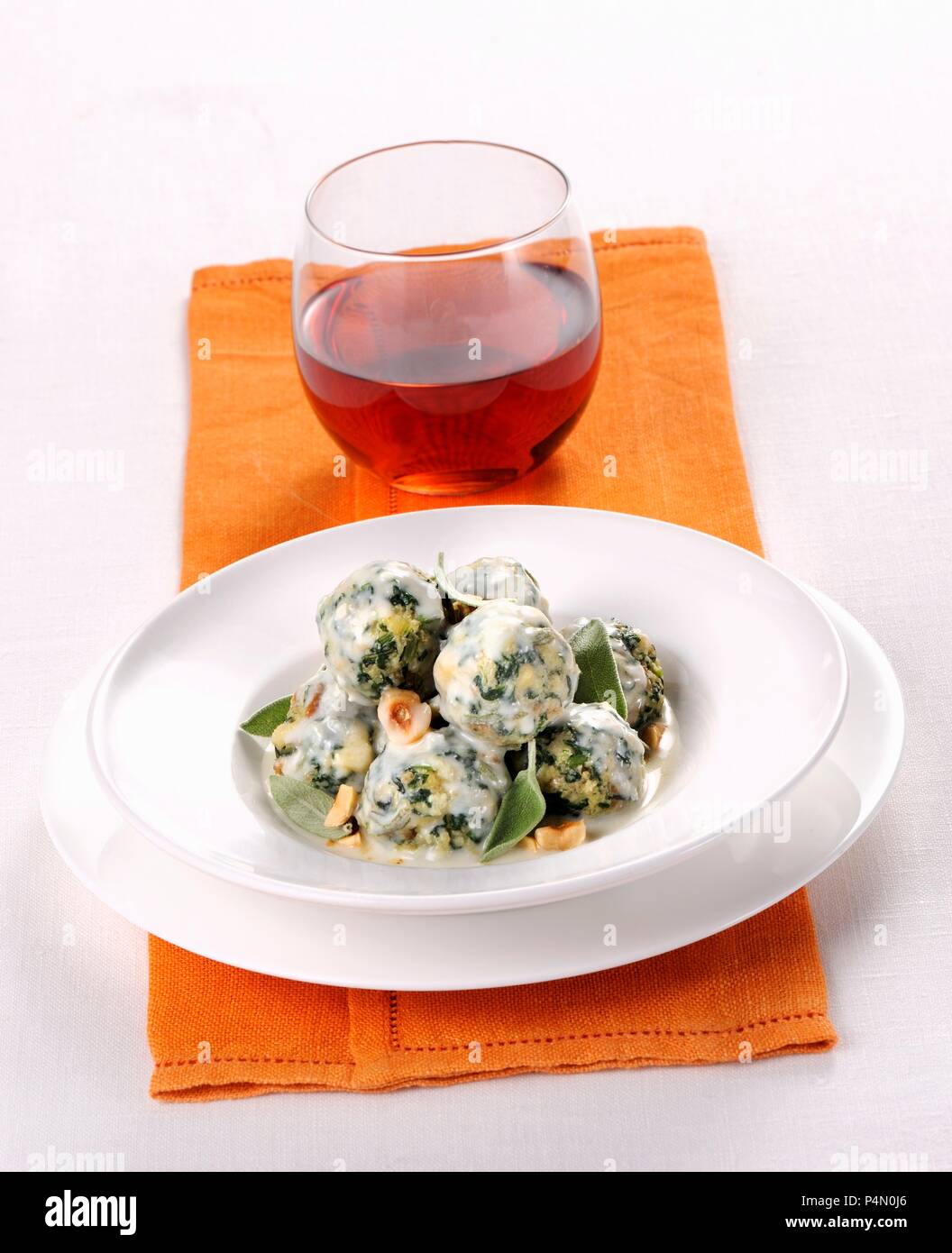 Bread dumplings with herbs and gorgonzola Stock Photo