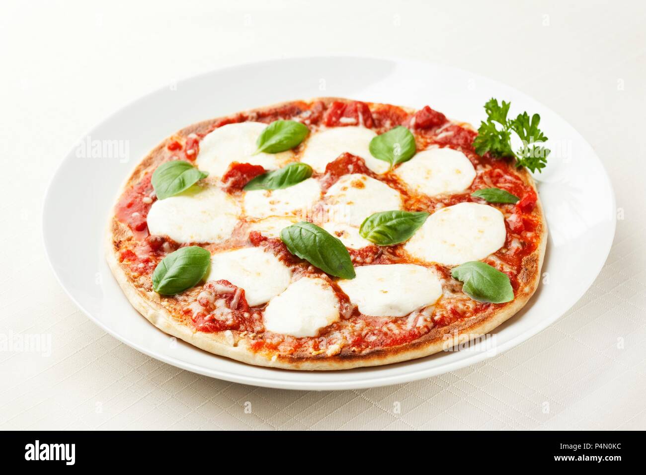 Whole Basil Cheese Pizza Stock Photo Alamy