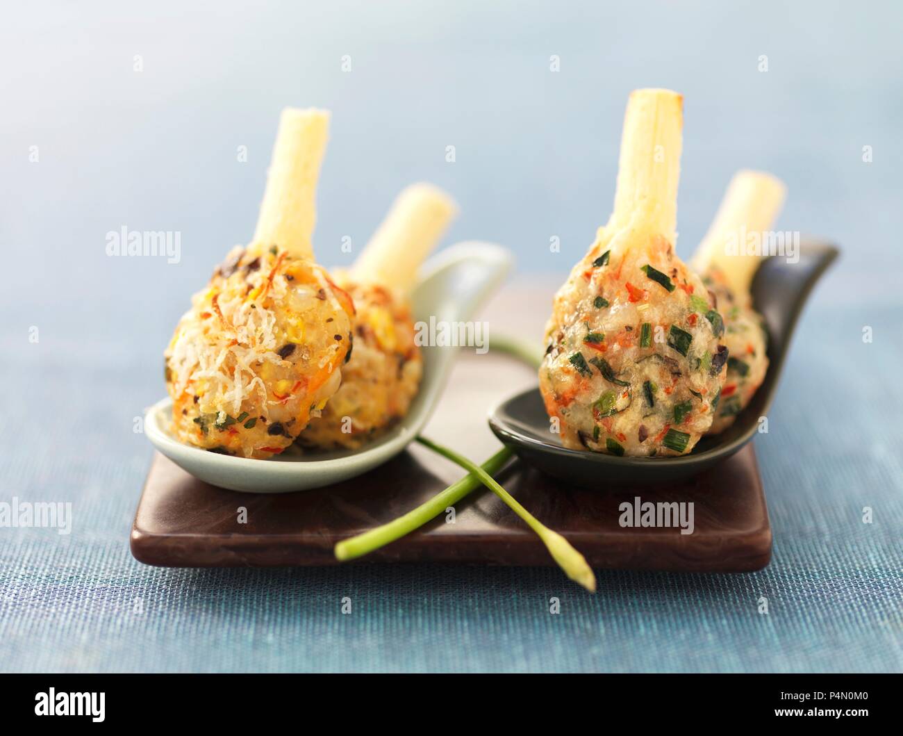 Prawn lollipops with cheese and herbs Stock Photo