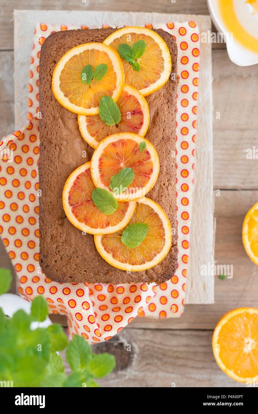 A loaf-shaped orange cake (seen from above) Stock Photo