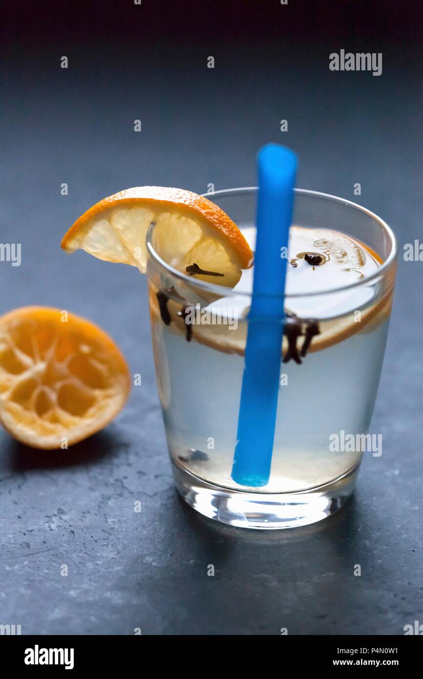 Lemonade in a glass with orange slices Stock Photo