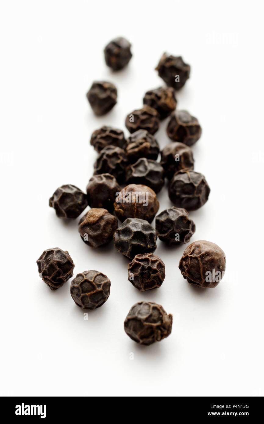 Black peppercorns (close-up) Stock Photo