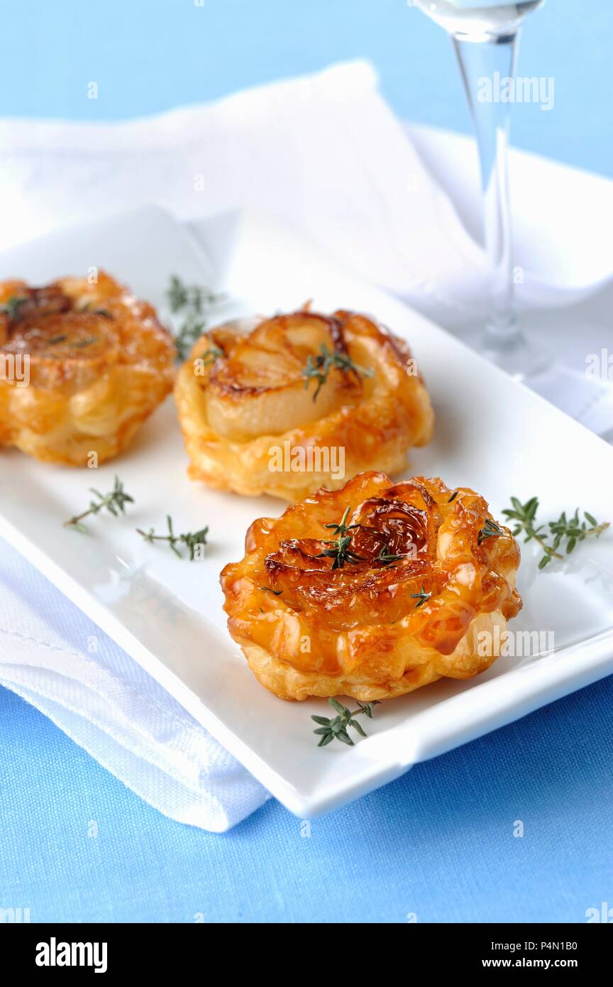 Mini tarte tatins with white onions Stock Photo